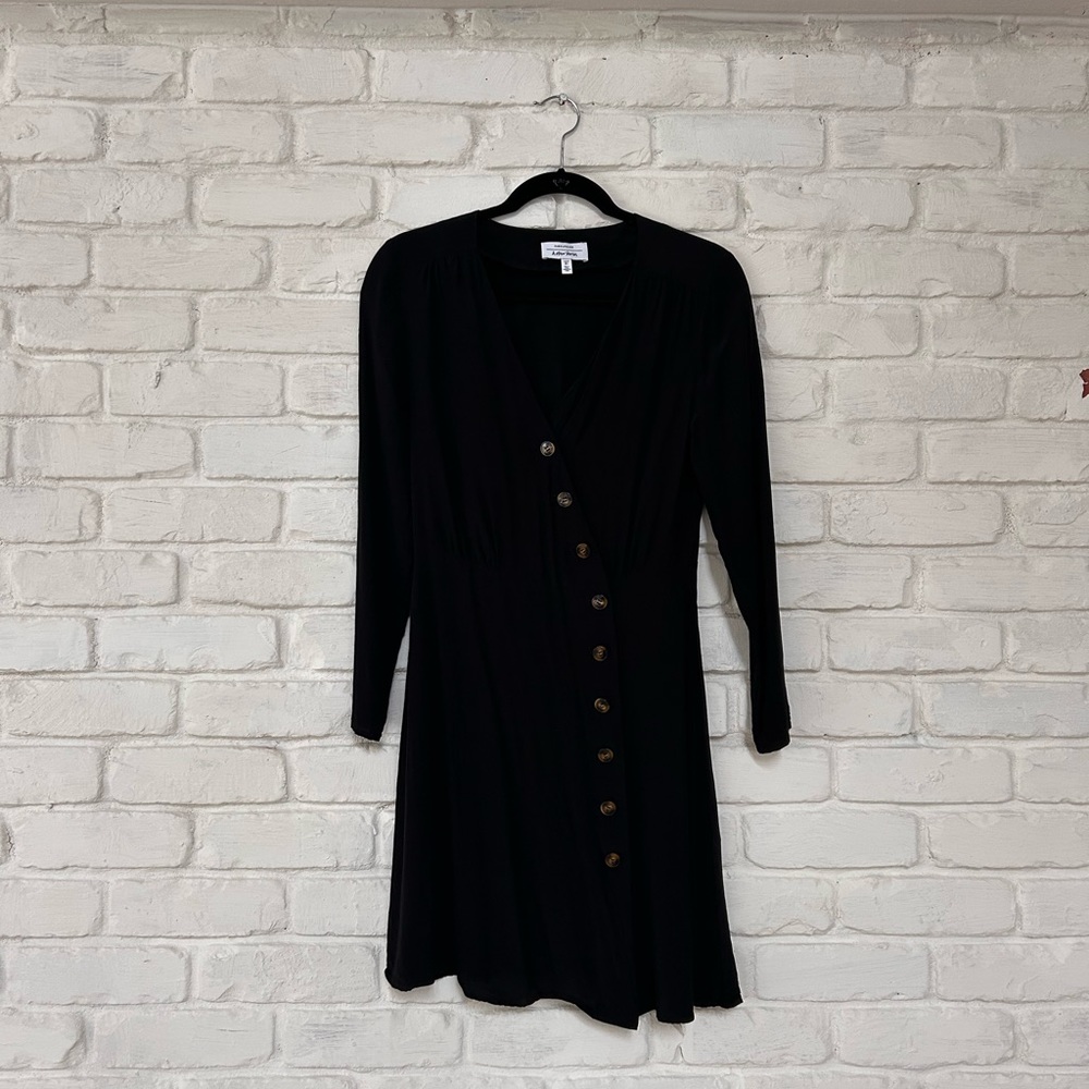 & Other Stories black dress with buttons. Hits above knee.